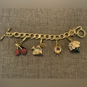 Juicy Couture Collectible Charm Bracelet like new.